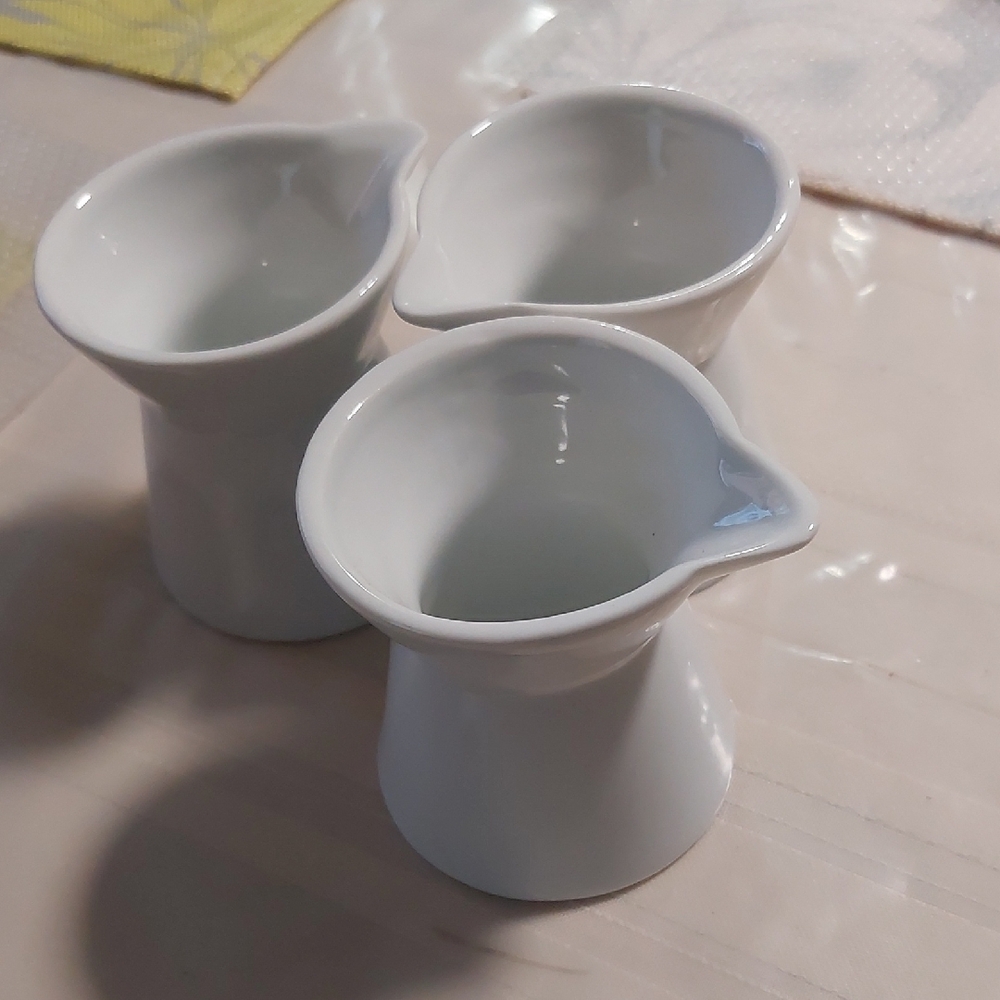 Set of Three White Ceramic Creamers